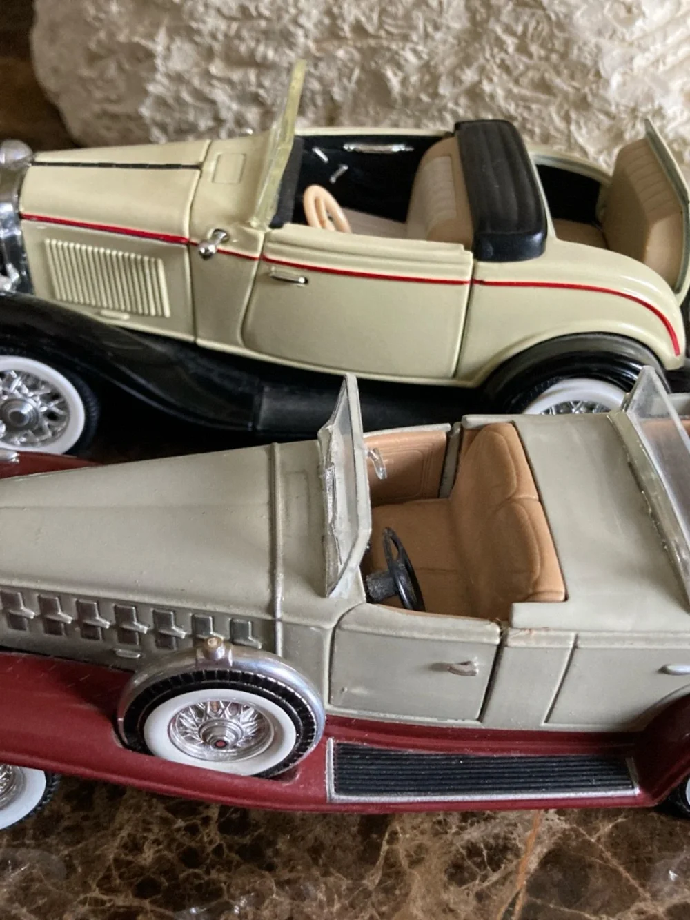 Set of two detailed classic convertible die-cast model cars,